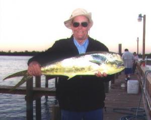 Dave Collingwood with a dolphin he caught out of the Ft. Pierce Inlet.